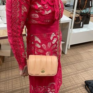 Brand new coach crossbody with tags! Orange/peach color. Super cute!